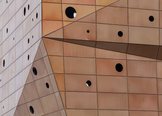 Illustration for article titled This Waste Incineration Power Plant Glows Like It's On Fire